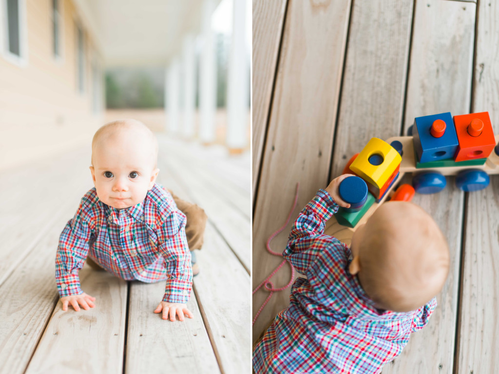 baby with a toy train