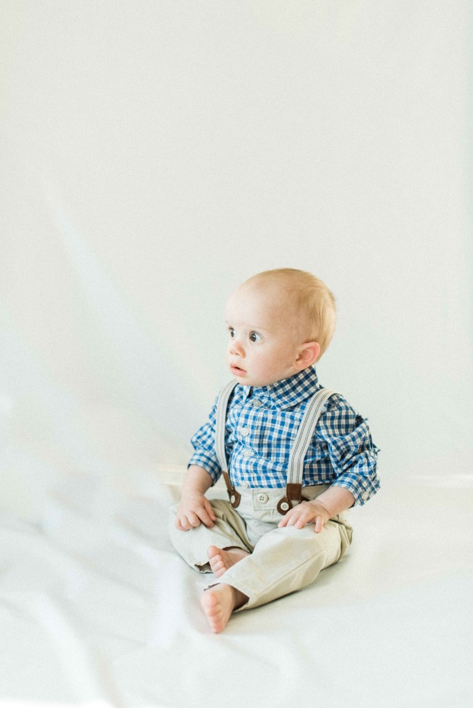 birthday boy in suspenders plaid