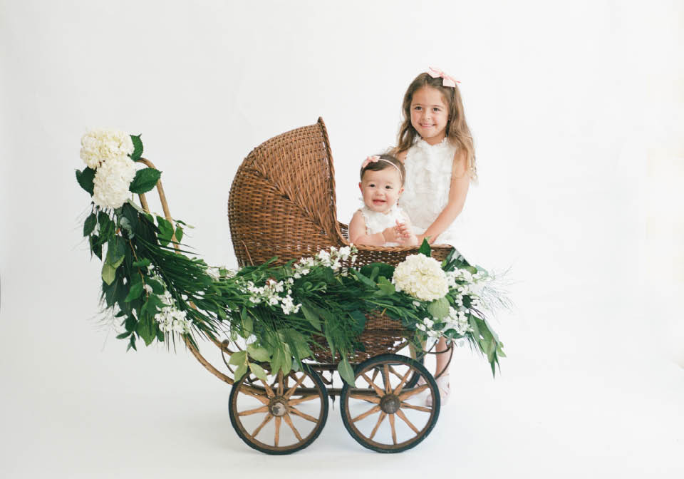 Sisters in antique buggy